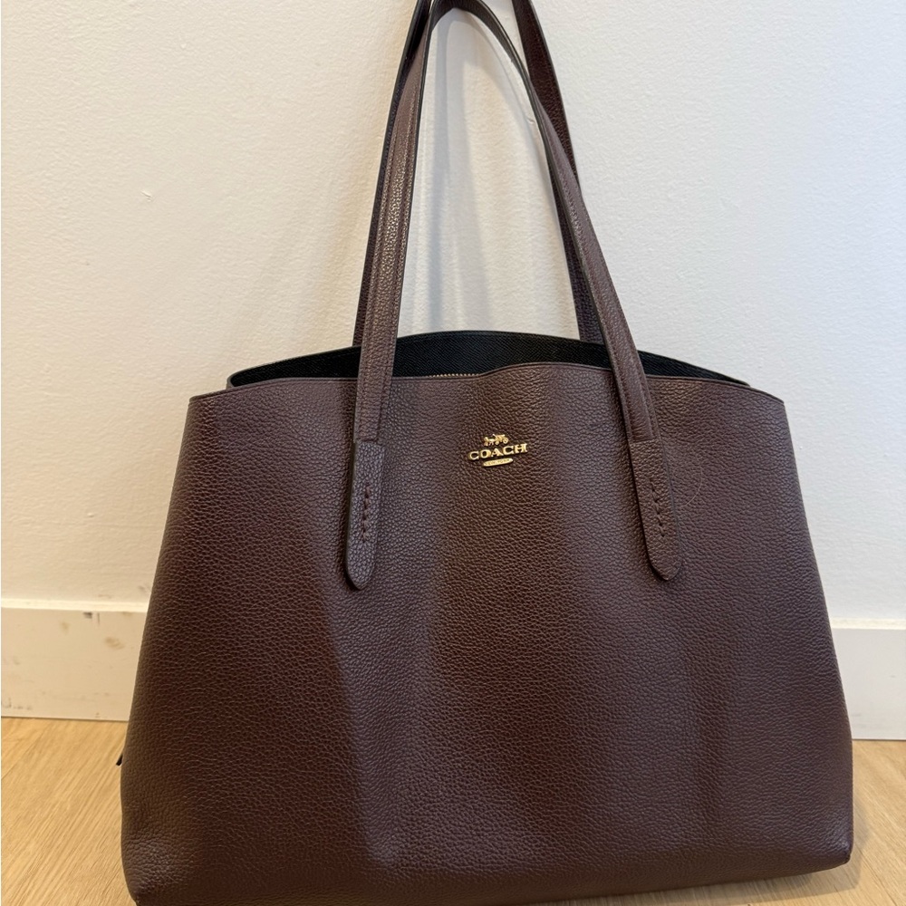 Coach Wine coloured Leather Tote with Gold Emblem and Structured Design